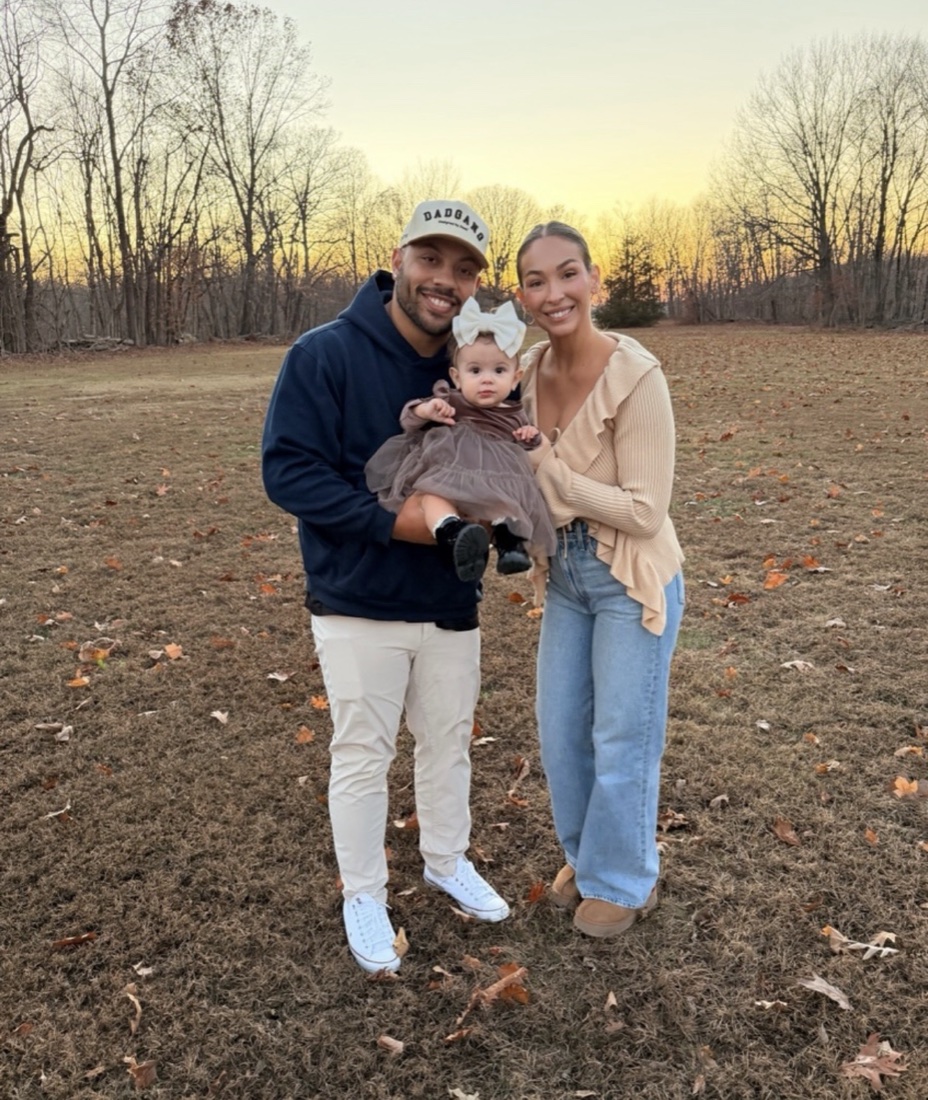 Michael Thompson with his family outdoors